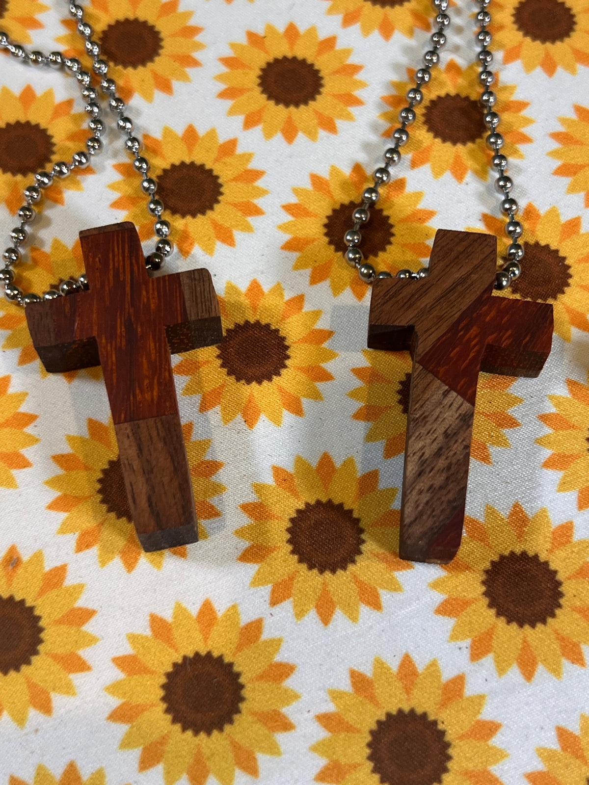 Wooden cross pendant necklace close-up