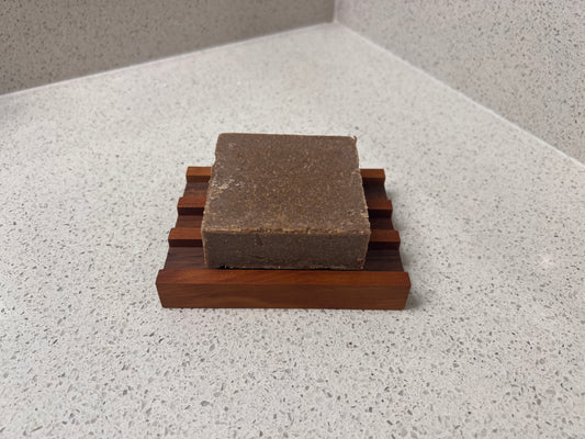 Soap HOLDERZ! soap dish holding a bar of soap raised above the drainage rails